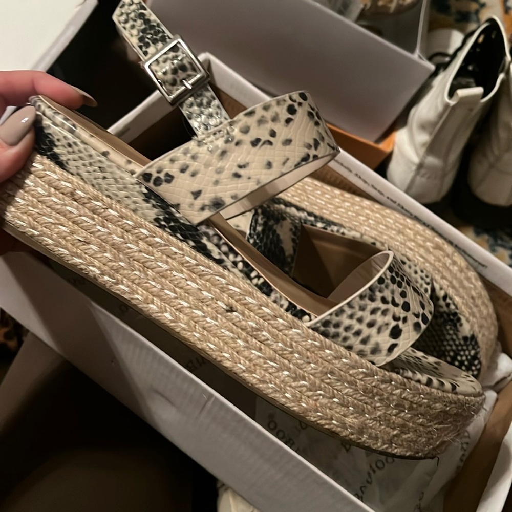 Size 8 snake flat/wedges.